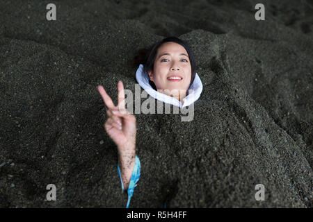 Profitez de femme sex bain de sable au Japon Banque D'Images