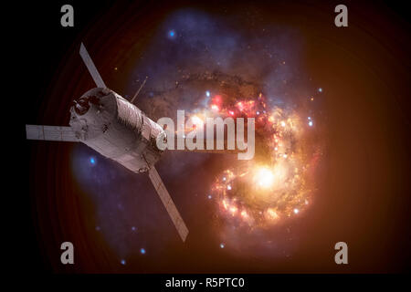 Vaisseaux Cargo - Le véhicule de transfert automatique sur galaxie spirale. Banque D'Images