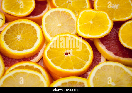 Tranches de pamplemousse Orange texture de fond. Banque D'Images