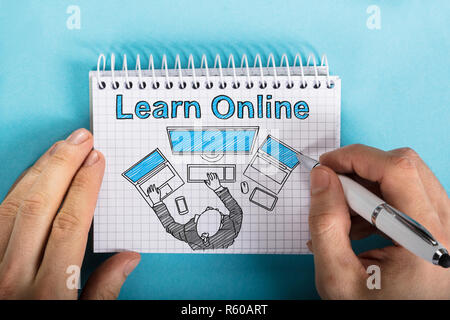 Portrait sur le bloc-notes à spirale à carreaux Banque D'Images