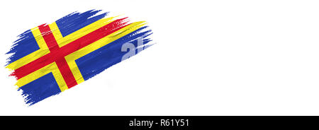 Drapeau peint des brosses. Le style dessiné à la main d'Aland drapeau isolé sur fond blanc avec place pour le texte. Banque D'Images