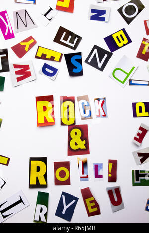 Un mot l'écriture de texte montrant concept de Rock And Roll faites de différents magazine journal lettre pour l'analyse de rentabilisation sur le fond blanc with copy space Banque D'Images