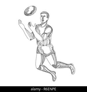 Aussie Rules Football Player Jumping Doodle Banque D'Images