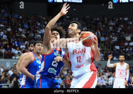 L'Iran a traité une autre perte d'accueil aux Philippines, 78-70 lors de leur cinquième match de la fenêtre dans le cadre de la Coupe du Monde de Basket-ball FIBA 2019 qualificatifs. L'Iran a été dirigé par Mohammad Jamshidi, qui a versé en 26 points pour l'équipe des visiteurs dans leur victoire. Les Philippines, qui ont perdu des matchs consécutifs à la cour, a été stimulé par le directeur Jason William qui a marqué 19 points dans son premier match de retour de sa suspension de trois-jeu pour son rôle dans la fameuse bagarre entre les Philippines et l'Australie pendant leur correspondance dans l'ancienne cour d'accueil. La prochaine série de qualificatifs se déroulera le février et le haut thr Banque D'Images