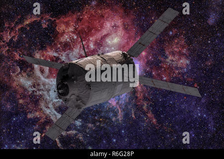 Vaisseaux Cargo - Le véhicule de transfert automatique sur galaxie spirale. Banque D'Images