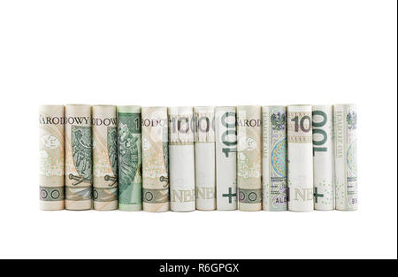 Billets polonais roulé isolé sur fond blanc Banque D'Images