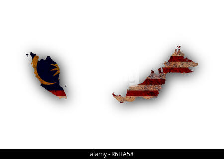 La carte et l'étendard de la Malaisie au métal rouillé Banque D'Images