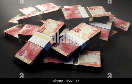 Une pile de réparties au hasard des paquets de billets en rand sud africain sur un fond isolé - 3D render Banque D'Images