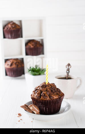 Muffins au chocolat ou café noir et capkakes Banque D'Images