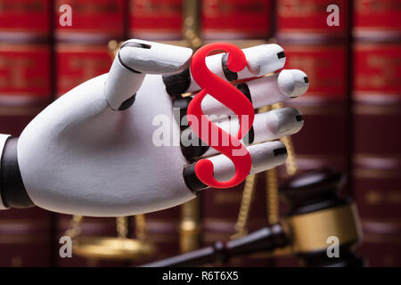 Symbole Paragraphe Holding Robot Banque D'Images