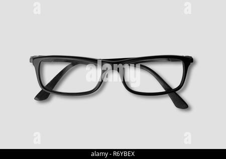 Lunettes noir sur gris isolé Banque D'Images