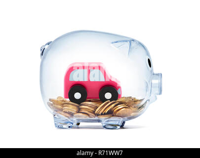 Location de jouet sur des crédits à l'intérieur transparent piggy bank with clipping path Banque D'Images