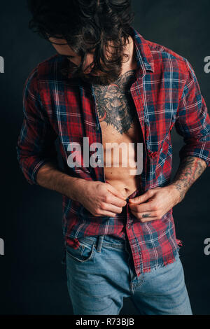 Portrait de hipster en chemise à carreaux Banque D'Images