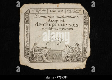 Cession de cinquante sols, avec l'image de personnifications des droits de l'homme et de la justice, affecté l'argent de papier argent papier swap, copie imprimée à partir de la série de huit assignats français presque identique sept numéros de série différents. Certaines petites notes blanches coupées sur le bord de l'image, d'autres plus grandes. L'assignat cinquante sols payables au porteur partager prêts payer Banque D'Images