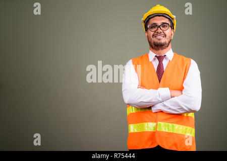 Persan barbu homme travailleur du bâtiment de couleur contre backgrou Banque D'Images