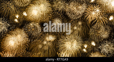 New Year's Eve fireworks gold golden background banner ans ans antécédents d'artifice Banque D'Images