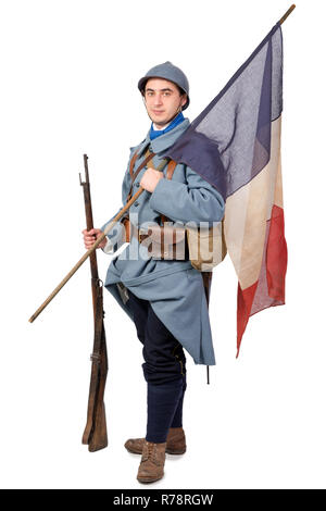 Soldat français 1914 1918 avec drapeau, isolé sur fond blanc Banque D'Images