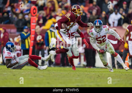 Landover, Maryland, USA. 09Th Nov, 2018. Redskins de Washington le receveur Josh Doctson (18) s'exécute avec la balle en face de New York Giants coffre Michael Thomas (31) et le secondeur Alec Ogletree (52) au cours de la deuxième moitié de la NFL match entre les Giants de New York et les Redskins de Washington à FedExField à Landover, Maryland. Taetsch Scott/CSM/Alamy Live News Banque D'Images