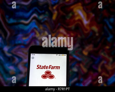 Kiev, Ukraine. Dec 10, 2018. State Farm Insurance company logo vu affichée sur téléphone intelligent. Crédit : Igor Golovniov SOPA/Images/ZUMA/Alamy Fil Live News Banque D'Images