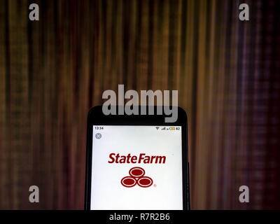 Kiev, Ukraine. Dec 10, 2018. State Farm Insurance company logo vu affichée sur téléphone intelligent. Crédit : Igor Golovniov SOPA/Images/ZUMA/Alamy Fil Live News Banque D'Images