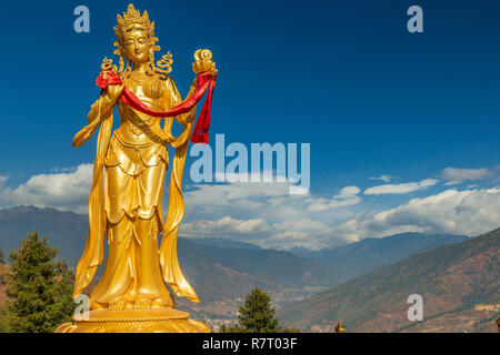 Statues en or à Thimphu, Bhoutan Banque D'Images