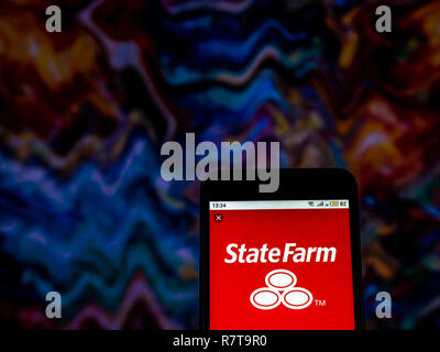 State Farm Insurance company logo vu affichée sur téléphone intelligent. Banque D'Images