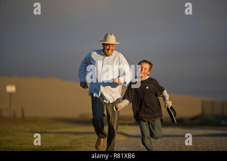 Père et fils d'exécution Banque D'Images