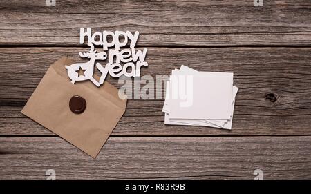Bonne année cartes de vœux. Composition sur les planches de bois. Banque D'Images