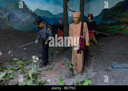 Diorama montrant la destruction du pavot à l'élimination des drogues Museum à Yangon, Myanmar.
