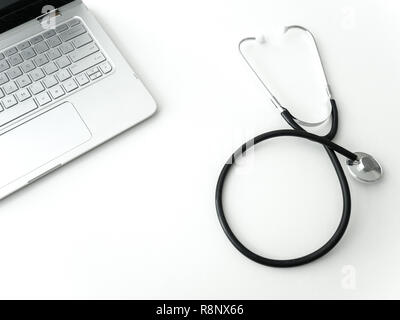 Un flexible en caoutchouc noir des médecins et de l'acier metal heart pulse portant stéthoscope isolé sur un dessus de table blanc avec clavier d'ordinateur portable dans la région de Corner maki Banque D'Images