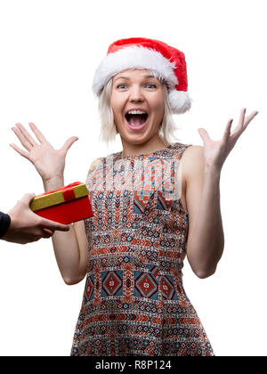 Photo de femme joyeuse à Santa's cap et man's hands with gift Banque D'Images