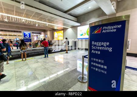 Nov 23, 2018 personnes en attente sur les bagages de l'aéroport de Manille NAIA 2 terminal, Metro Manila, Philippines Banque D'Images