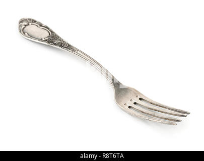 Old silver fork isolated on white Banque D'Images