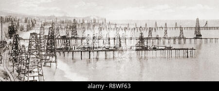 Puits forés dans le lit de l'océan Pacifique à Summerland, entre Santa Barbara et Los Angleles, Californie, États-Unis d'Amérique), ch. 1915. Le premier puits de pétrole offshore, forés à partir de piles en 1896. Merveilleux de Californie, publié en 1915. Banque D'Images