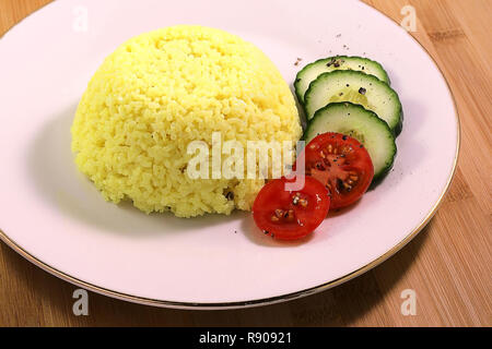 Nasi Kuning sur une plaque Banque D'Images