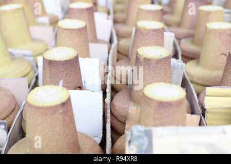 Sable enrobé de résine de coulée pour produits Banque D'Images