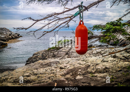 Une aile bateau accrocher sur l'arbre de l'Isle au Haut du port de canard Banque D'Images