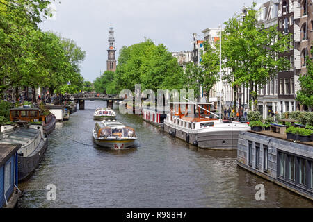 Bateaux de croisière touristique sur le canal Prinsengracht à Amsterdam, Pays-Bas Banque D'Images