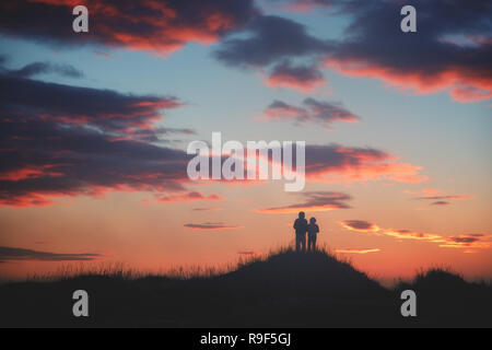 Coucher de couple tourné l'Islande Banque D'Images