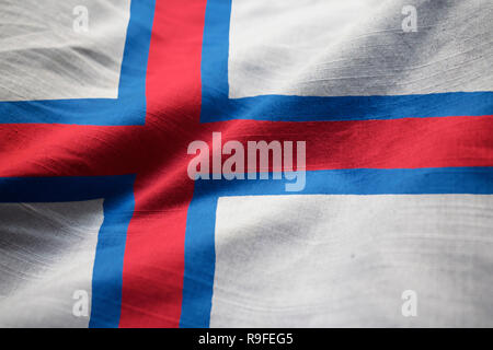 Gros plan du drapeau des Îles Féroé ébouriffé, Faroe Islands Flag Blowing in Wind Banque D'Images