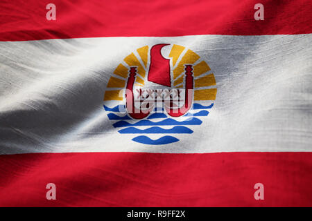 Gros plan du talon et la Polynésie française, la Polynésie française Drapeau Flag Blowing in Wind Banque D'Images