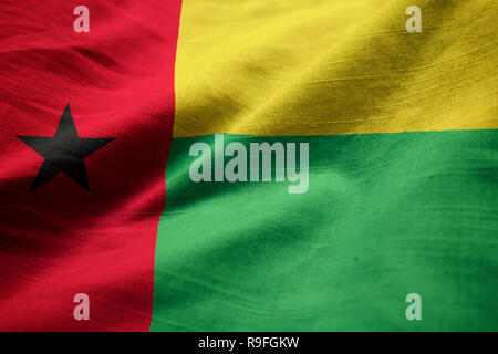 Gros plan du drapeau, la Guinée-Bissau Guinée-Bissau ébouriffé Flag Blowing in Wind Banque D'Images