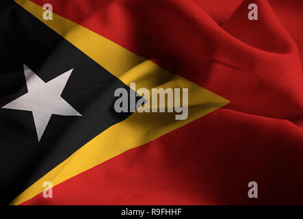 Gros plan du talon et le Timor oriental, le Timor oriental Drapeau Flag Blowing in Wind Banque D'Images