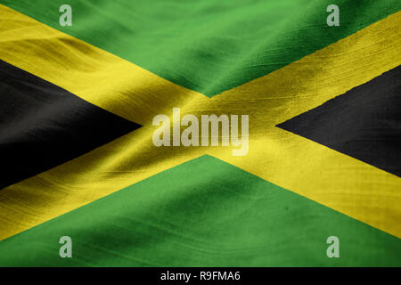 Gros plan du talon et la Jamaïque, Jamaïque Drapeau Flag Blowing in Wind Banque D'Images