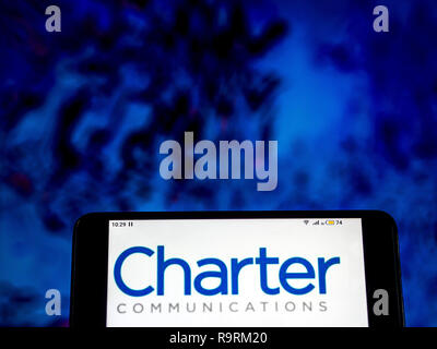 Kiev, Ukraine. Dec 12, 2018. Charter Communications Télécommunications logo de l'entreprise vu affichée sur un téléphone intelligent. Crédit : Igor Golovniov SOPA/Images/ZUMA/Alamy Fil Live News Banque D'Images