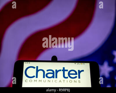 Kiev, Ukraine. Dec 12, 2018. Charter Communications Télécommunications logo de l'entreprise vu affichée sur un téléphone intelligent. Crédit : Igor Golovniov SOPA/Images/ZUMA/Alamy Fil Live News Banque D'Images