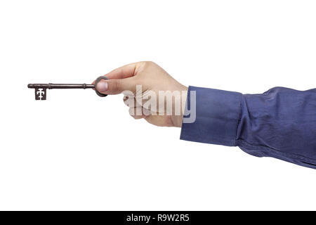 Businessman hand holding vintage key isolated Banque D'Images