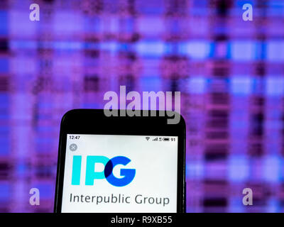 Interpublic Group of Companies publicité logo de l'entreprise vu affichée sur smart phone Banque D'Images