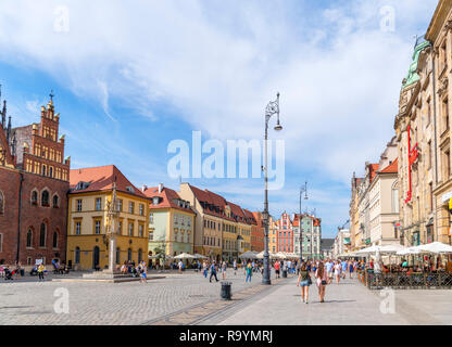 Wroclaw, Vieille Ville (Stare Miasto). Boutiques et cafés sur la place du marché (Rynek we Wrocławiu), Wroclaw, Pologne Banque D'Images