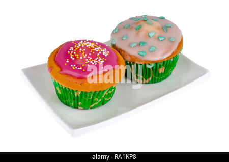 Deux des mini cupcakes avec glaçage coloré. Studio Photo Banque D'Images